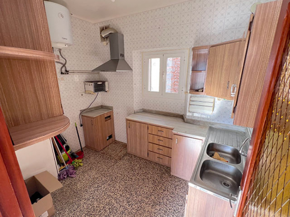 Cocina con posibilidad de reforma para crear espacio diáfano