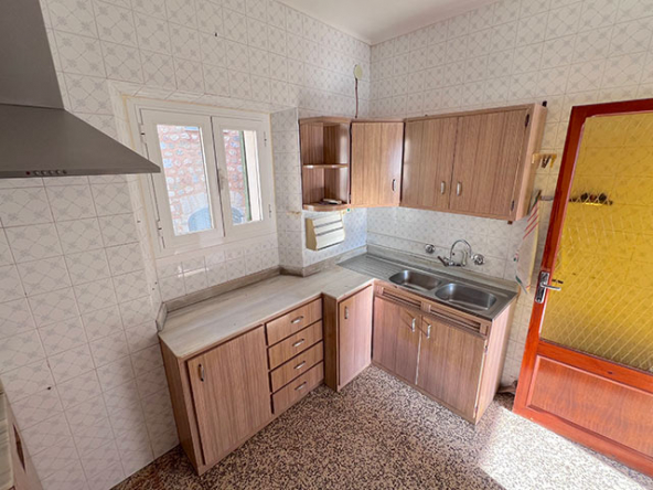 Cocina independiente con potencial para abrir al comedor